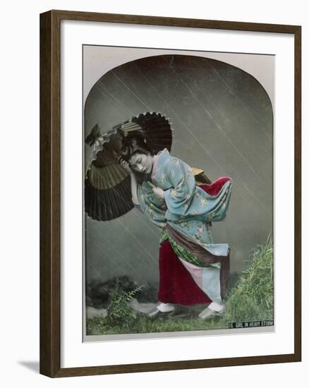 Young Japanese Girl in the Rain, c.1900-Japanese Photographer-Framed Photographic Print