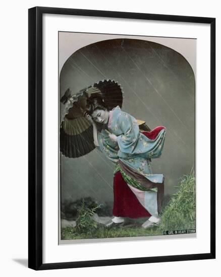 Young Japanese Girl in the Rain, c.1900-Japanese Photographer-Framed Photographic Print