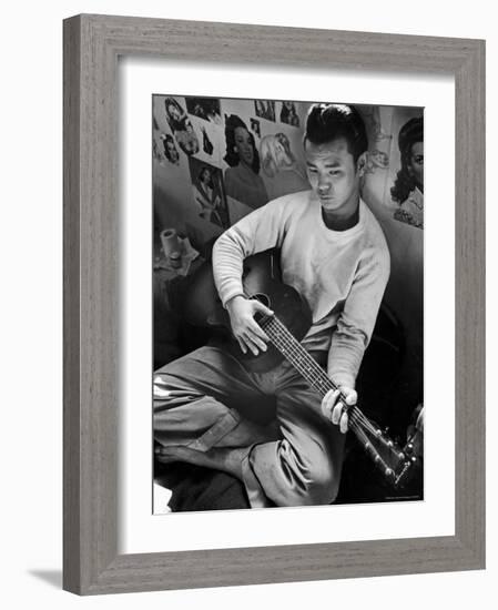 Young Japanese Nisei Playing Guitar in the Stockade at Tule Lake Segregation Center-Carl Mydans-Framed Photographic Print