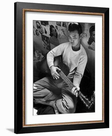 Young Japanese Nisei Playing Guitar in the Stockade at Tule Lake Segregation Center-Carl Mydans-Framed Photographic Print