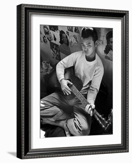 Young Japanese Nisei Playing Guitar in the Stockade at Tule Lake Segregation Center-Carl Mydans-Framed Photographic Print