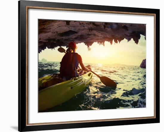 Young Lady Paddling the Kayak from Limestone Cave towards Open Sea-Dudarev Mikhail-Framed Photographic Print