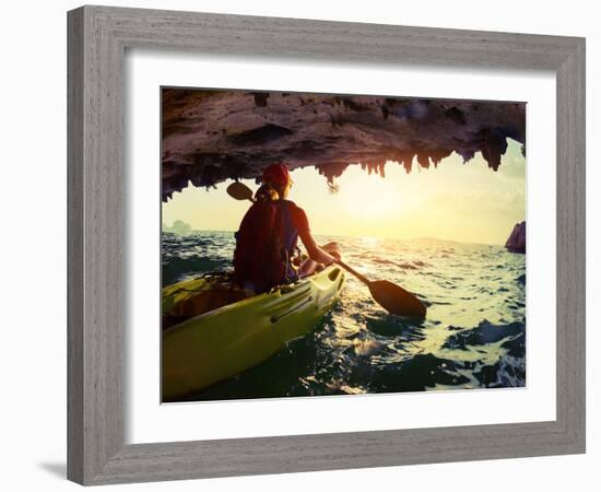 Young Lady Paddling the Kayak from Limestone Cave towards Open Sea-Dudarev Mikhail-Framed Photographic Print