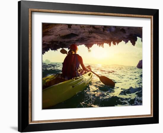 Young Lady Paddling the Kayak from Limestone Cave towards Open Sea-Dudarev Mikhail-Framed Photographic Print