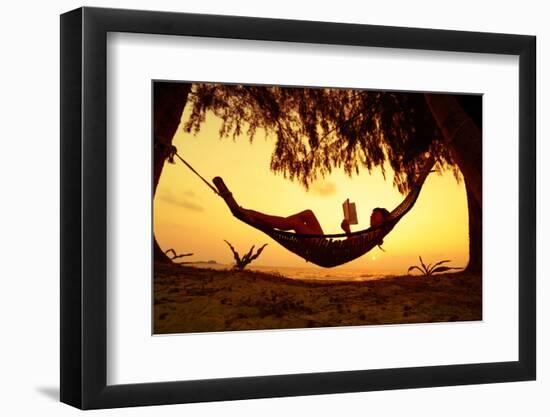 Young Lady Reading the Book in the Hammock on Tropical Beach at Sunset-Dudarev Mikhail-Framed Photographic Print