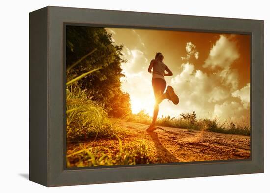 Young Lady Running on a Rural Road during Sunset-Dudarev Mikhail-Framed Premier Image Canvas