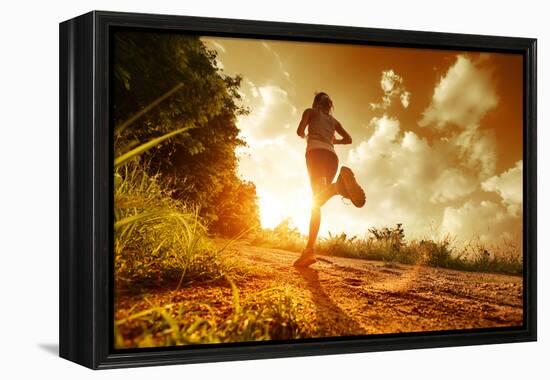 Young Lady Running on a Rural Road during Sunset-Dudarev Mikhail-Framed Premier Image Canvas