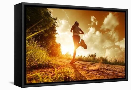 Young Lady Running on a Rural Road during Sunset-Dudarev Mikhail-Framed Premier Image Canvas