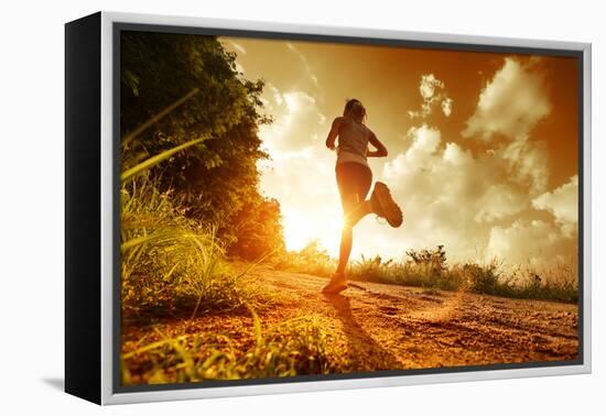 Young Lady Running on a Rural Road during Sunset-Dudarev Mikhail-Framed Premier Image Canvas