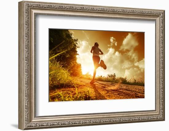 Young Lady Running on a Rural Road during Sunset-Dudarev Mikhail-Framed Photographic Print