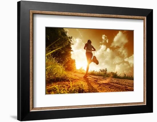 Young Lady Running on a Rural Road during Sunset-Dudarev Mikhail-Framed Photographic Print