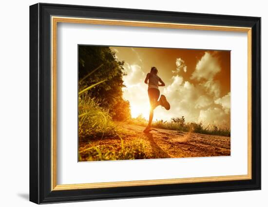 Young Lady Running on a Rural Road during Sunset-Dudarev Mikhail-Framed Photographic Print