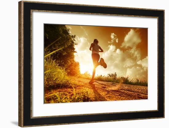 Young Lady Running on a Rural Road during Sunset-Dudarev Mikhail-Framed Photographic Print