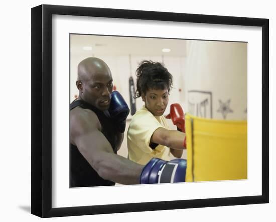 Young Male Coach Coaching a Female Boxer-null-Framed Photographic Print