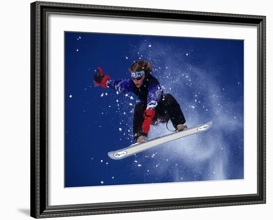 Young Male Snowboarder in Action-null-Framed Photographic Print