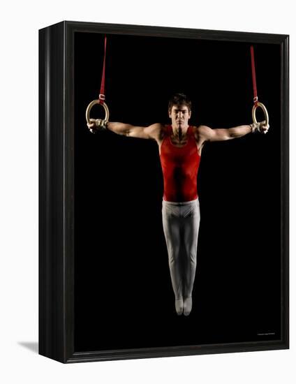 Young Man Exercising on Gymnastic Rings, Bainbridge Island, Washington State, USA-null-Framed Premier Image Canvas