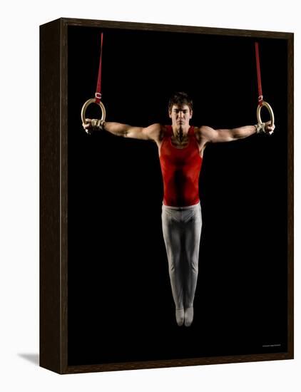 Young Man Exercising on Gymnastic Rings, Bainbridge Island, Washington State, USA-null-Framed Premier Image Canvas