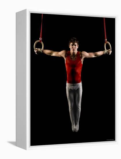 Young Man Exercising on Gymnastic Rings, Bainbridge Island, Washington State, USA-null-Framed Premier Image Canvas