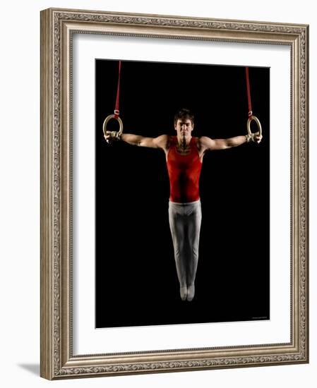 Young Man Exercising on Gymnastic Rings, Bainbridge Island, Washington State, USA-null-Framed Photographic Print