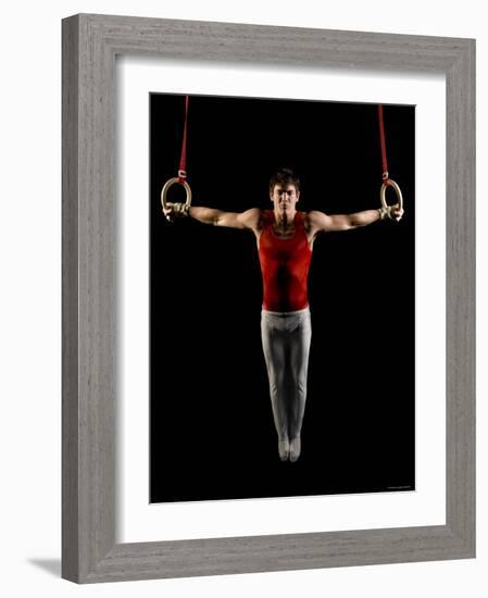 Young Man Exercising on Gymnastic Rings, Bainbridge Island, Washington State, USA-null-Framed Photographic Print