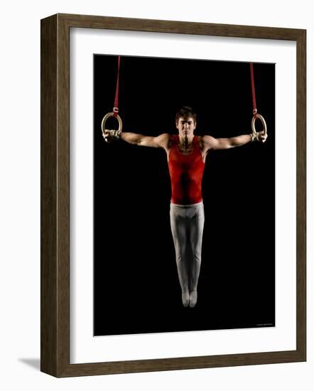 Young Man Exercising on Gymnastic Rings, Bainbridge Island, Washington State, USA-null-Framed Photographic Print