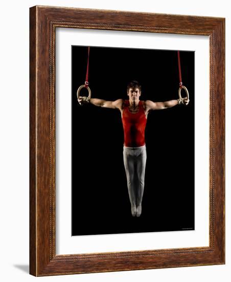 Young Man Exercising on Gymnastic Rings, Bainbridge Island, Washington State, USA-null-Framed Photographic Print