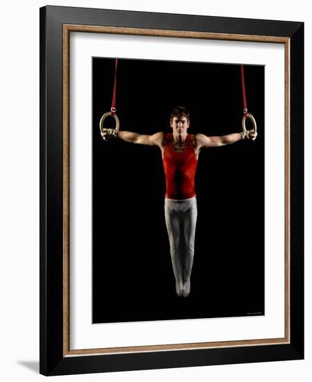 Young Man Exercising on Gymnastic Rings, Bainbridge Island, Washington State, USA-null-Framed Photographic Print