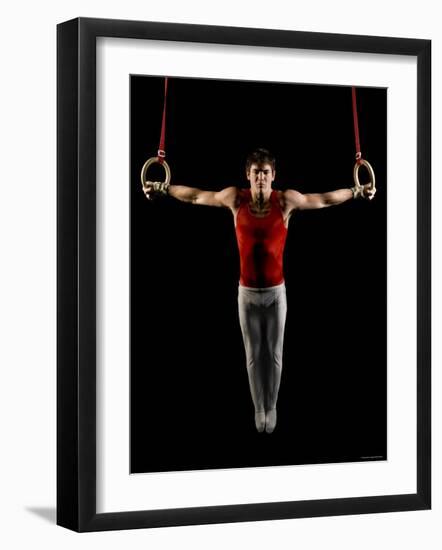 Young Man Exercising on Gymnastic Rings, Bainbridge Island, Washington State, USA-null-Framed Photographic Print