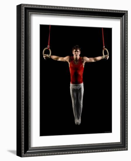 Young Man Exercising on Gymnastic Rings, Bainbridge Island, Washington State, USA-null-Framed Photographic Print