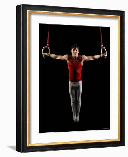 Young Man Exercising on Gymnastic Rings, Bainbridge Island, Washington State, USA-null-Framed Photographic Print