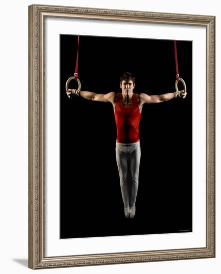 Young Man Exercising on Gymnastic Rings, Bainbridge Island, Washington State, USA-null-Framed Photographic Print