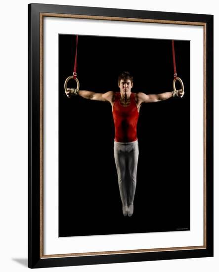 Young Man Exercising on Gymnastic Rings, Bainbridge Island, Washington State, USA-null-Framed Photographic Print