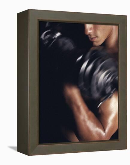 Young Man Exercising with Dumbbells-null-Framed Premier Image Canvas