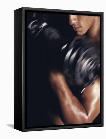 Young Man Exercising with Dumbbells-null-Framed Premier Image Canvas