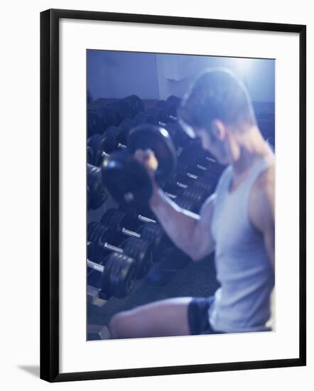 Young Man Exercising with Dumbbells-null-Framed Photographic Print