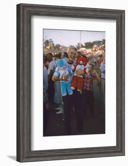 Young Man Holding Stuffed Bears Prizes at a Carnival Game at the Iowa State Fair, 1955-John Dominis-Framed Photographic Print