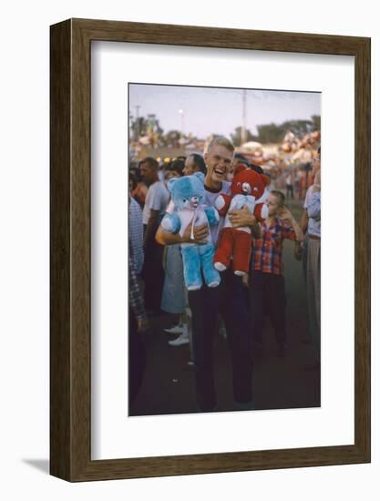 Young Man Holding Stuffed Bears Prizes at a Carnival Game at the Iowa State Fair, 1955-John Dominis-Framed Photographic Print
