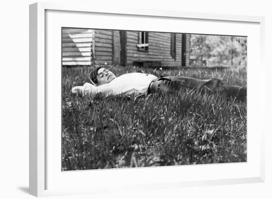 Young Man Lays in the Grass, Ca. 1912-null-Framed Photographic Print