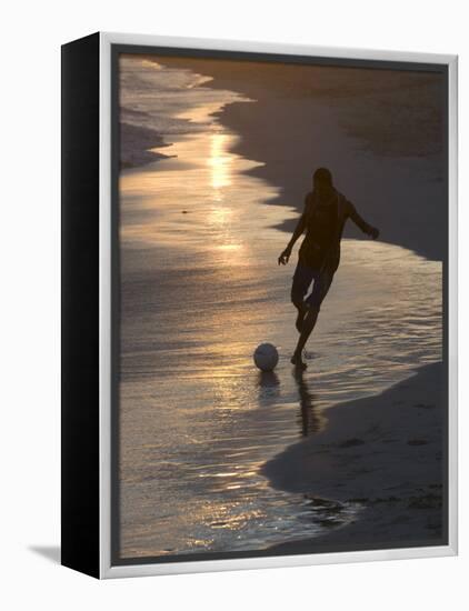Young Man Playing Football at Sandbeach in Twilight, Santa Maria, Sal, Cape Verde, Africa-Michael Runkel-Framed Premier Image Canvas