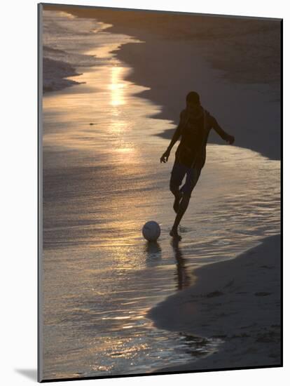 Young Man Playing Football at Sandbeach in Twilight, Santa Maria, Sal, Cape Verde, Africa-Michael Runkel-Mounted Photographic Print