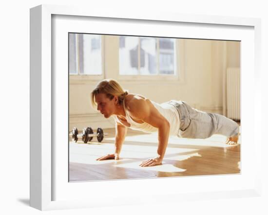 Young Man Preforming Push Up Exercise in Gym, New York, New York, USA-Chris Trotman-Framed Photographic Print