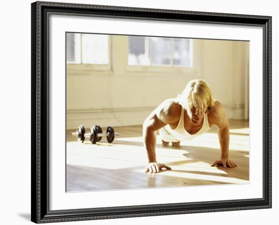 Young Man Preforming Push Up Exercise in Gym, New York, New York, USA-Chris Trotman-Framed Photographic Print