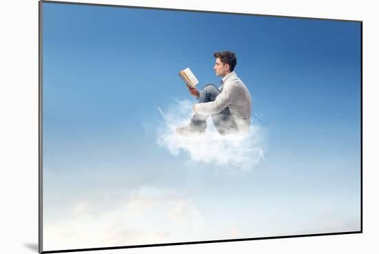 Young Man Reads Sitting On A Cloud-olly2-Mounted Art Print