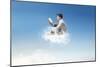 Young Man Reads Sitting On A Cloud-olly2-Mounted Art Print