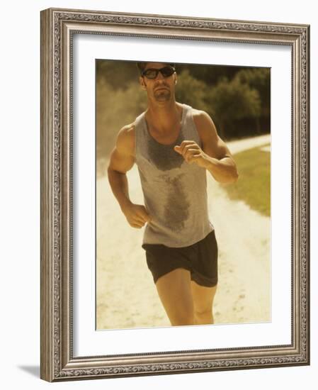 Young Man Running on the Beach-null-Framed Photographic Print