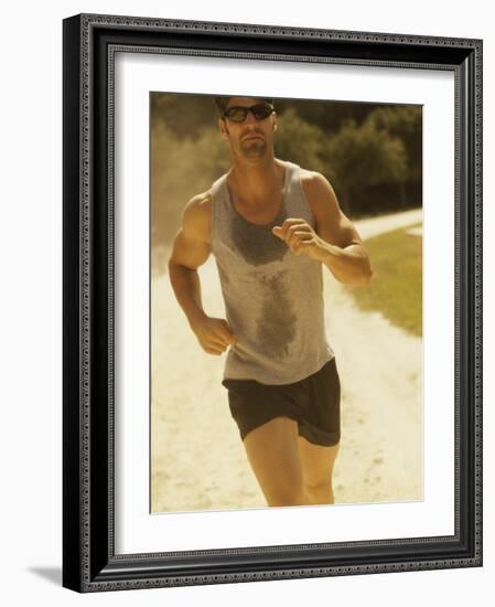Young Man Running on the Beach-null-Framed Photographic Print