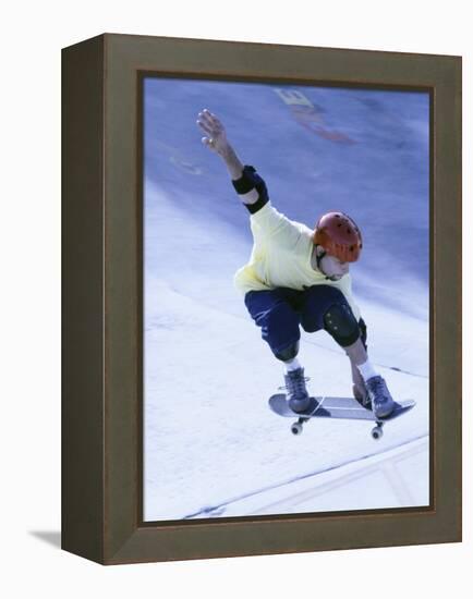 Young Man Skateboarding in Mid Air-null-Framed Premier Image Canvas