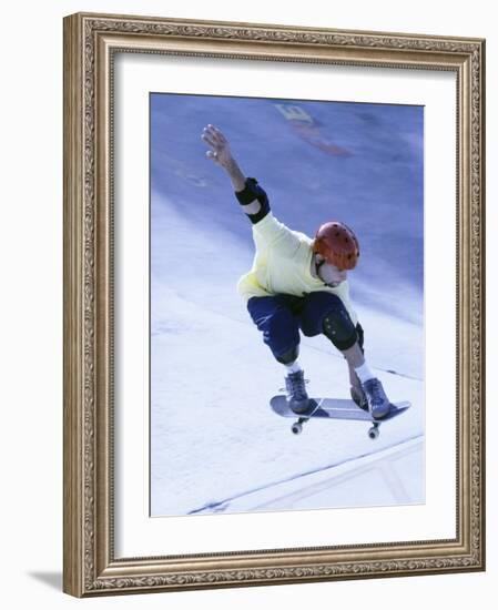 Young Man Skateboarding in Mid Air-null-Framed Photographic Print