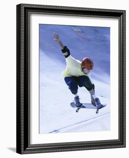 Young Man Skateboarding in Mid Air-null-Framed Photographic Print