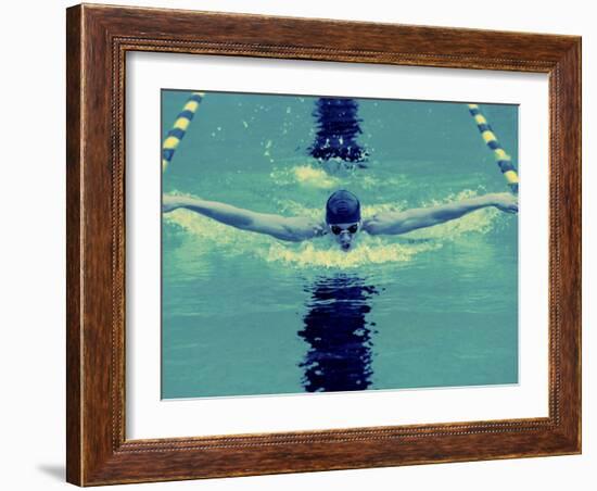 Young Man Swimming the Butterfly Stroke-null-Framed Photographic Print